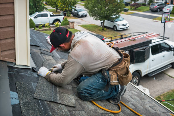 Professional Roofing technician working in West Bloomfield, NY